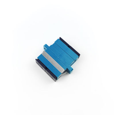 FTTH SC Διορθωτής οπτικών ινών με υλικό UPC Eared Dustproof Duplex Coupler PBT